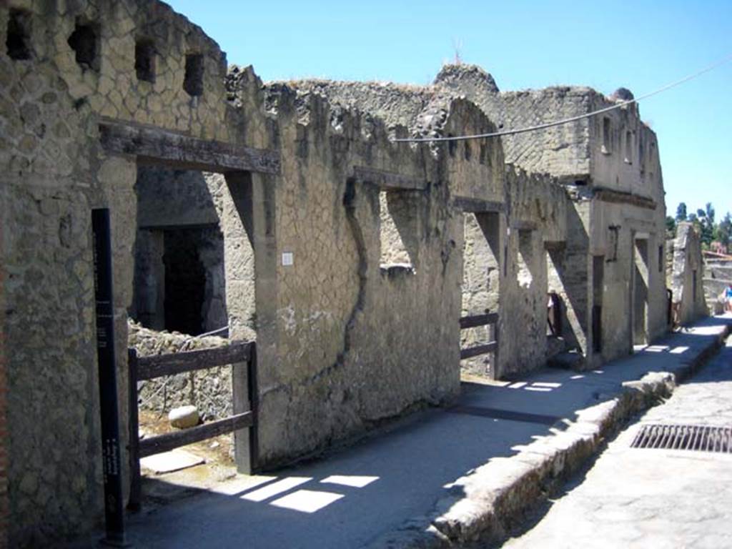 VI.25 Herculaneum, on left. June 2011.Looking south along east side of Cardo III Superiore towards VI.29, with upper floor. Photo courtesy of Sera Baker.